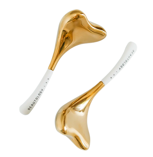 24K gold facial massage tool for skincare application and beauty routine